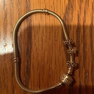 14k ALL GOLD PANDORA BRACELET WITH THREE SPACERS 7.5” on ruler